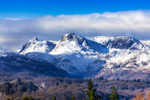 Wray Castle and the Langdale Pikes, Cumbria, England.